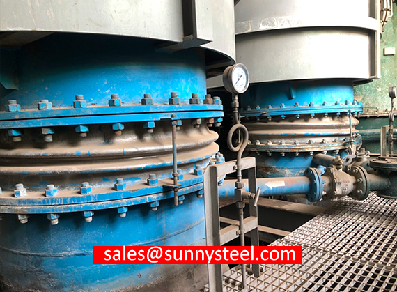 Rubber expansion joint with underground cover and mating flange